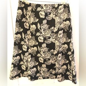 Beautiful black flirty skirt with roses